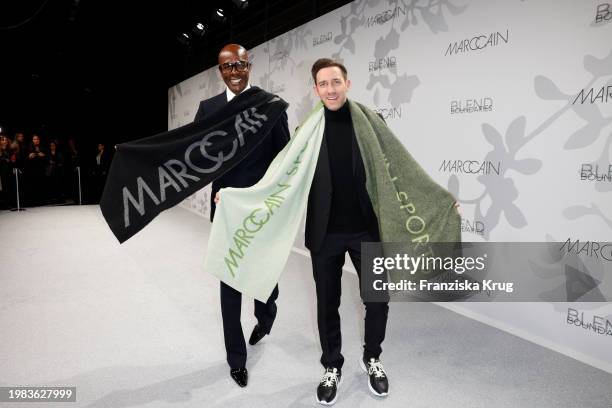 Marcel Remus and Bruce Darnell attend the Marc Cain Fashion Show at Arena Berlin on February 6, 2024 in Berlin, Germany.