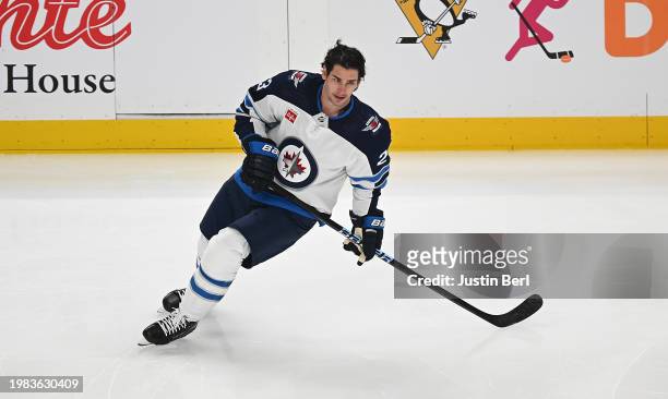 Sean Monahan of the Winnipeg Jets skates in warmups before the game against the Pittsburgh Penguins at PPG PAINTS Arena on February 6, 2024 in...