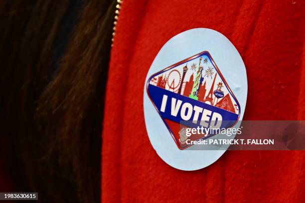 Voter wears an I Voted sticker with the Las Vegas skyline at a Clark County vote center on Election Day during the Nevada 2024 presidential primary...