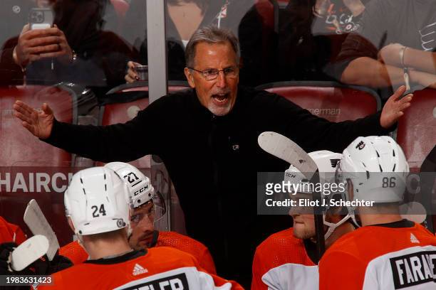 Philadelphia Flyers Head Coach John Tortorella gives his team instructions during a break in the action against the Florida Panthers at the Amerant...