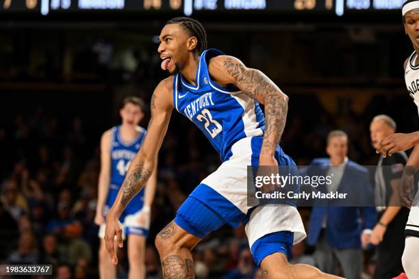 Jordan Burk of the Kentucky Wildcats celebrates a dunk against the Vanderbilt Commodores at Memorial Gymnasium on February 6, 2024 in Nashville,...