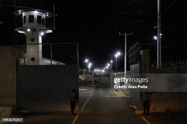 Officers stand guard outside an access gate at CECOT in Tecoluca on February 6, 2024 in San Vicente, El Salvador. On February of 2023, El Salvador...