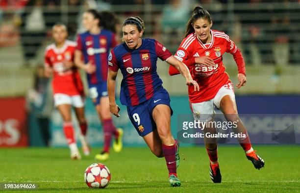 Mariona Caldentey of FC Barcelona with Ana Seica of SL Benfica in action during the Group A - UEFA Women's Champions League 2023/24 match between SL...