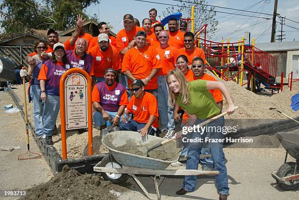 Actress Karri Turner, of the television series JAG, helps build a playground at the St. Columbkille School in Los Angeles, May 8, 2003 California....