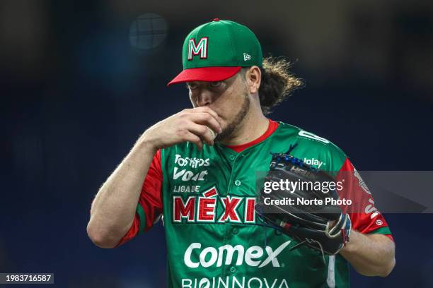 Starting pitcher Wilmer Rios of Naranjeros of Mexico reacts in the first inning of a game between Mexico and Panama at loanDepot park as part of...