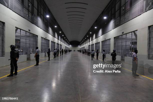 Officers stand on patrol outside cells at CECOT in Tecoluca on February 6, 2024 in San Vicente, El Salvador. On February of 2023 El Salvador...