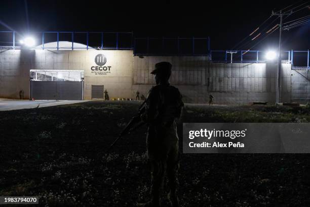 Soldier stands on patrol along the perimeter at CECOT in Tecoluca on February 6, 2024 in San Vicente, El Salvador. On February of 2023 El Salvador...