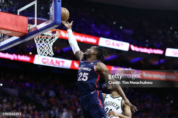 Danuel House Jr. #25 of the Philadelphia 76ers shoots a lay up past Cam Thomas of the Brooklyn Nets during the third quarter at the Wells Fargo...