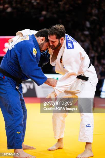 Aaron Wolf of Japan and Nikoloz Sherazdishvili of Spain compete during the Men's -100kg 2024 Judo Grand Slam Paris. The Accor Arena, in Paris, hosted...