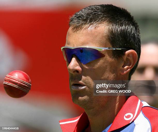 File picture of England spinner Ashley Giles preparing to bowl during a training session on the eve of the third Ashes cricket Test against Australia...