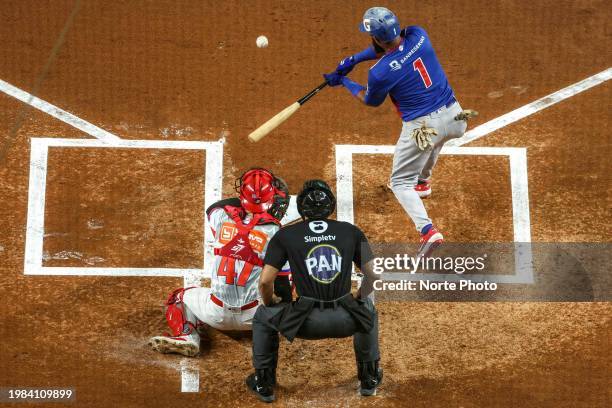 Emilio Bonifacio of Tigres del Licey of Dominican swings during his at-bat in the first inning of a game between the Dominican Republic and Puerto...