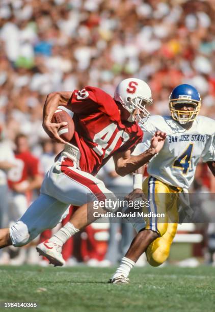 Wide Receiver Ed McCaffrey of the Stanford Cardinal runs after making a catch during an NCAA football game against the San Jose State Spartans on...