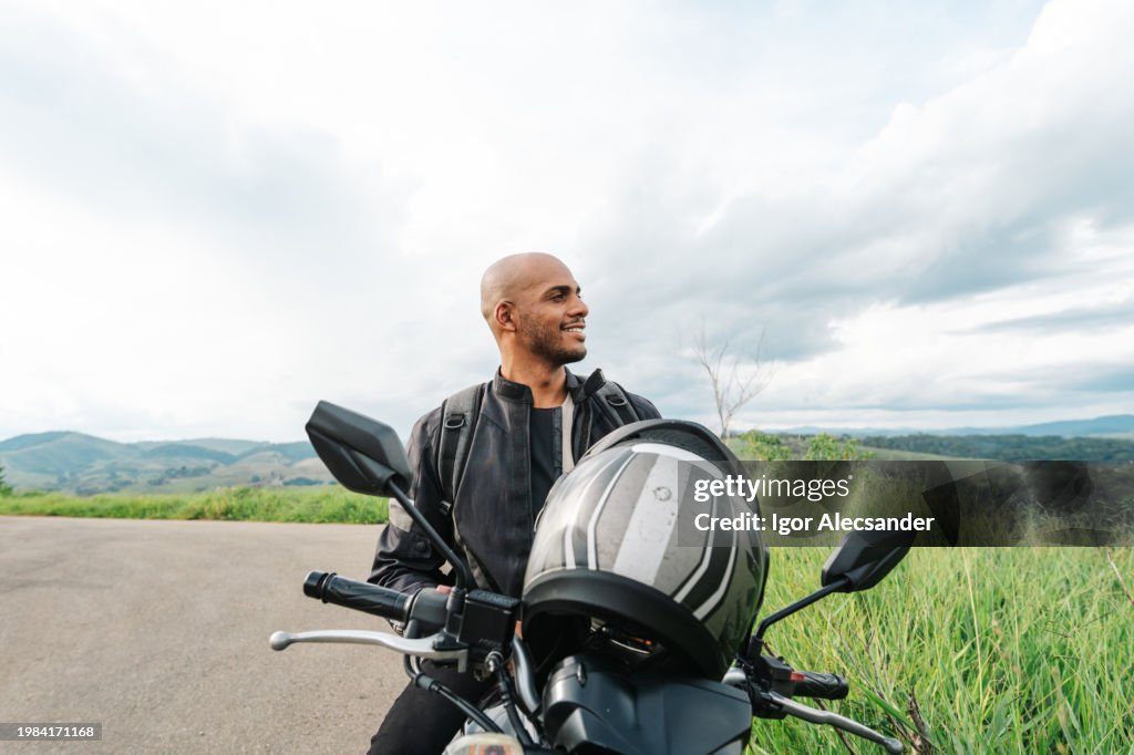 Motorcyclist enjoying the countryside view