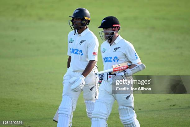 Rachin Ravindra and Kane Williamson of New Zealand leave the field of play at the end of day one of the First Test in the series between New Zealand...