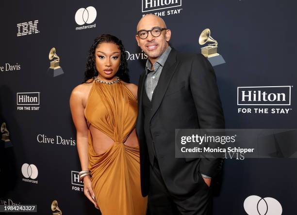 Megan Thee Stallion and CEO of the Recording Academy Harvey Mason jr. Attends the Pre-GRAMMY Gala & GRAMMY Salute to Industry Icons Honoring Jon...