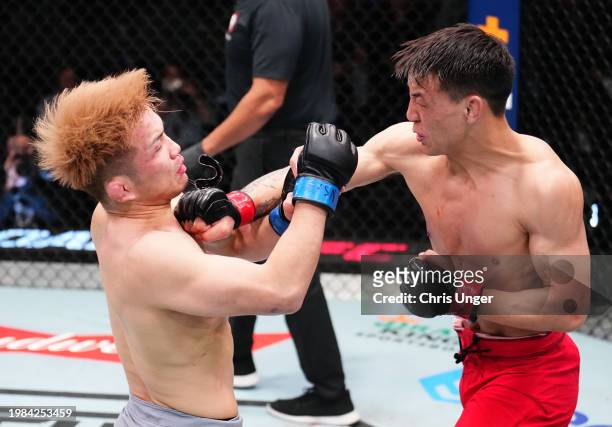 Rongzhu of China punches Shin Haraguchi of Japan in a lightweight fight during the Road to UFC Finals at UFC APEX on February 03, 2024 in Las Vegas,...