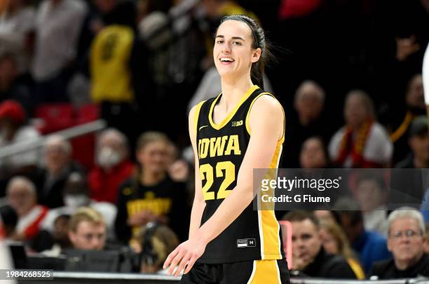 Caitlin Clark of the Iowa Hawkeyes celebrates in the fourth quarter against the Maryland Terrapins at Xfinity Center on February 03, 2024 in College...