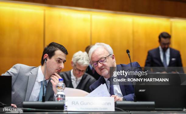 Christian Herrmann and Peter Gundermann, prosecution lawyers of representative Deka Investment wait for the start of the model case proceedings in...