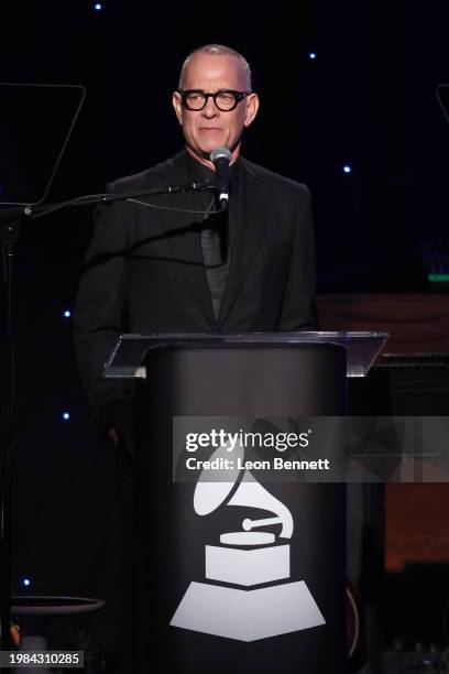 Tom Hanks speaks onstage during the Pre-GRAMMY Gala & GRAMMY Salute to Industry Icons Honoring Jon Platt at The Beverly Hilton on February 03, 2024...
