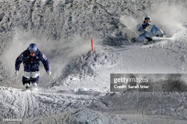 Nick Page and Charlie Mickel of Team United States compete during the final rounds of the Men's Dual Moguls Competition at the Intermountain...