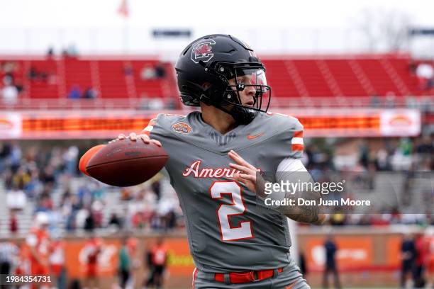Quarterback Spencer Rattler of South Carolina from the American Team warms up before the 2024 Reese's Senior Bowl at Hancock Whitney Stadium on the...