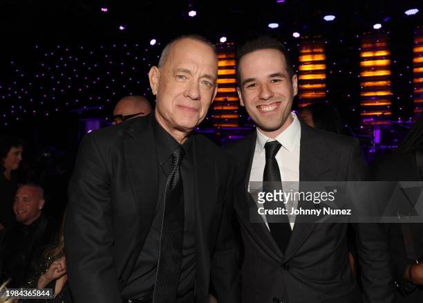 Tom Hanks and Edgar Barrera attend the Pre-GRAMMY Gala & GRAMMY Salute to Industry Icons Honoring Jon Platt at The Beverly Hilton on February 03,...
