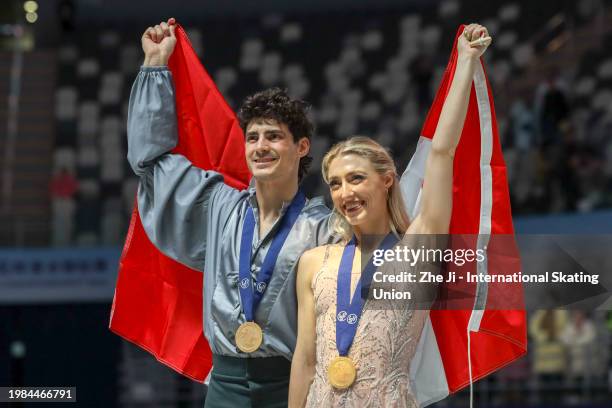 Gold medalists Piper Gilles and Paul Poirier of Canada pose at the medal ceremony for the Ice Dance Free Dance during on day four of the ISU Four...