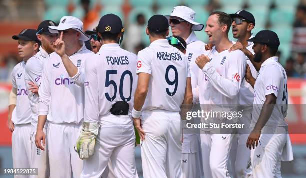 England bowler Tom Hartley and team mates celebrate the review decision for the wicket of India batsman Axar Patel during day three of the 2nd Test...