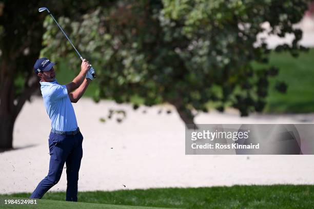Scott Jamieson of Scotland plays his second shot on the first hole during Day Four of the Ras Al Khaimah Championship at Royal Golf Club on February...