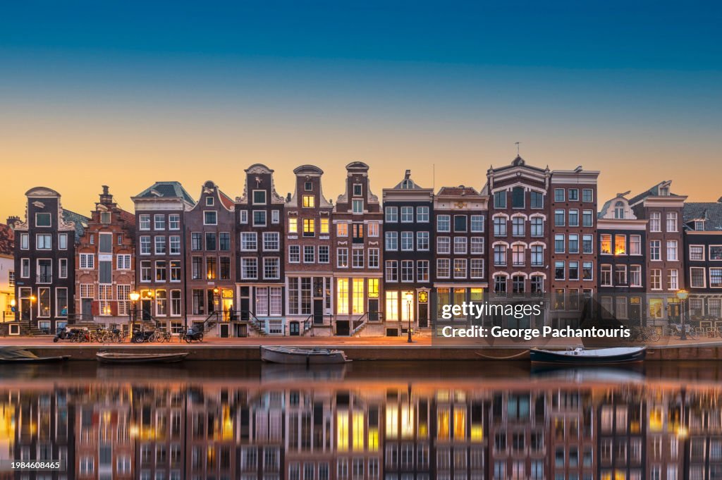 Architecture and reflection in Amsterdam at dusk
