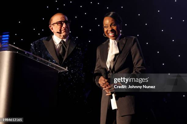 Clive Davis and Gladys Knight speak onstage during the Pre-GRAMMY Gala & GRAMMY Salute to Industry Icons Honoring Jon Platt at The Beverly Hilton on...