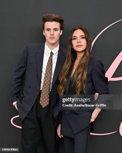 Romeo Beckham and Victoria Beckham attend the Premiere of "Lola" at Regency Bruin Theatre on February 03, 2024 in Los Angeles, California.