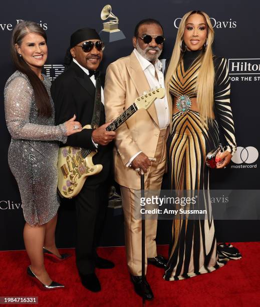 Tracy Isley, Ernie Isley and Ronald Isley of the Isley Brothers, and Kandy Johnson Isley attend the 66th GRAMMY Awards Pre-GRAMMY Gala & GRAMMY...
