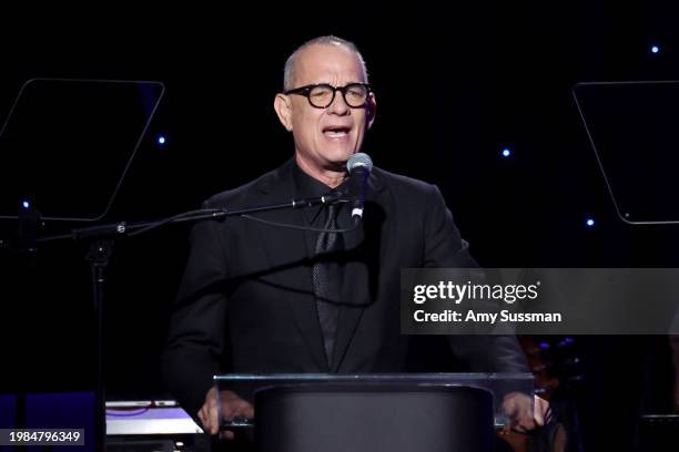 Tom Hanks speaks onstage during the 66th GRAMMY Awards Pre-GRAMMY Gala & GRAMMY Salute to Industry Icons Honoring Jon Platt at The Beverly Hilton on...