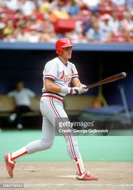 Clint Hurdle of the St. Louis Cardinals bats against the Pittsburgh Pirates during a Major League Baseball game at Three Rivers Stadium in 1986 in...