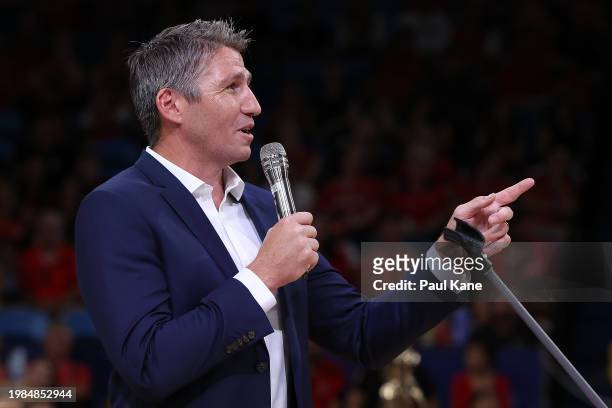Former Wildcats player and captain Damian Martin talks during his jersey retirement ceremony following the round 18 NBL match between Perth Wildcats...