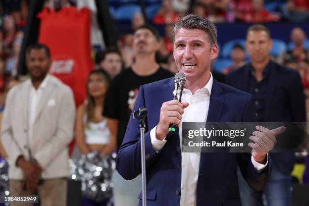 Former Wildcats player and captain Damian Martin talks during his jersey retirement ceremony following the round 18 NBL match between Perth Wildcats...