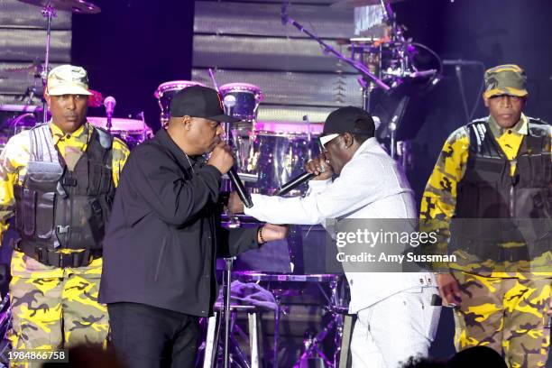 Chuck D and Flavor Flav of Public Enemy perform onstage during the 66th GRAMMY Awards Pre-GRAMMY Gala & GRAMMY Salute to Industry Icons Honoring Jon...