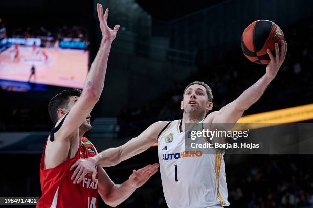Fabien Causeur of Real Madrid and Gyorgy Goloman of Basquet Girona in action during Liga Endesa match between Real Madrid and Basquet Girona at...