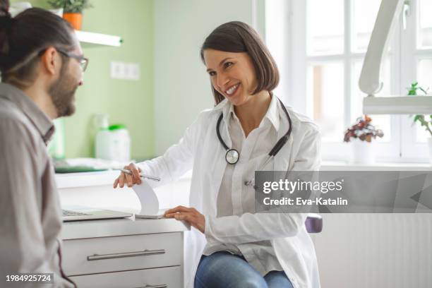 doctors collaborating - sick leave stock pictures, royalty-free photos & images
