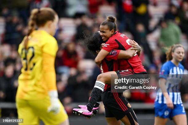 Nikita Parris of Manchester United celebrates celebrates scoring her team's first goal with teammate Geyse during the Barclays Women's Super League...