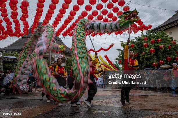 Dragon dancer performs during the Grebeg Sudiro festival festival as part of the Lunar New Year celebrations on February 4, 2024 in Solo City,...