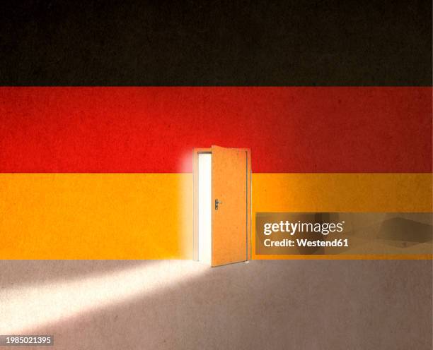 german flag with light of opportunity behind ajar door to immigrate in germany - einwanderer stock-grafiken, -clipart, -cartoons und -symbole