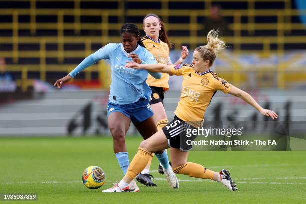 Khadija Shaw of Manchester City is challenged by Sophie Howard of Leicester City during the Barclays Women's Super League match between Manchester...