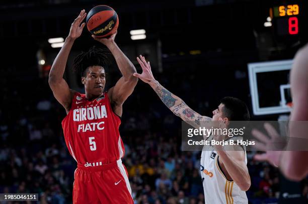 Gabriel Deck of Real Madrid and Yves Pons of Basquet Girona in action during Liga Endesa match between Real Madrid and Basquet Girona at WiZink...