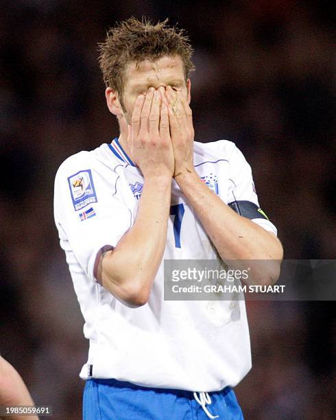 Iceland's captain, Hermann Hreidarsson reacts after missing a scoring oppurtunity as they lose 2-1 to Scotland during the FIFA World Cup 2010...
