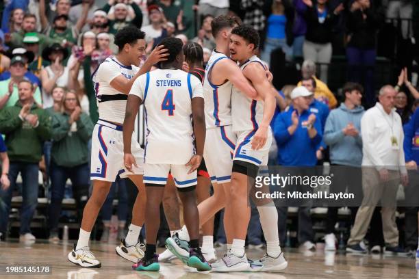 The Colorado State Rams celebrate a shot during a college basketball game against the San Diego State Aztecs at the Moby Arena on January 30, 2024 in...