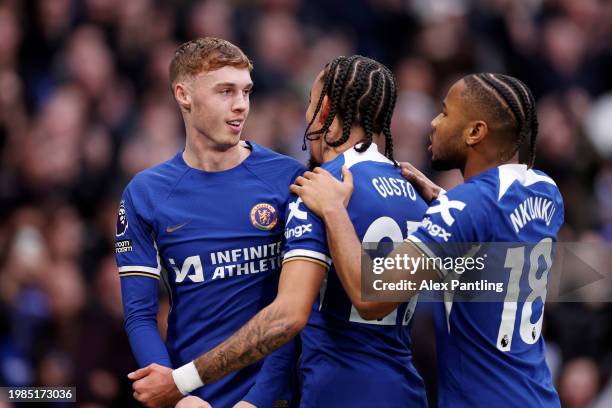 Cole Palmer of Chelsea celebrates scoring his team's first goal during the Premier League match between Chelsea FC and Wolverhampton Wanderers at...