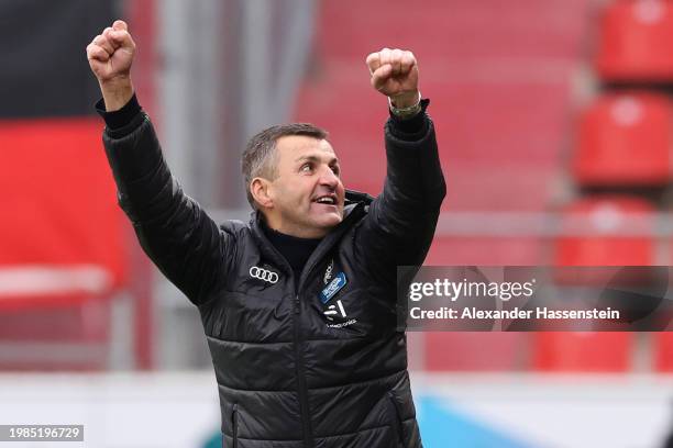 Michael Köllner, head coach of Ingolstadt celebrates victory after winning the 3. Liga match between FC Ingolstadt 04 and Dynamo Dresden at Audi...