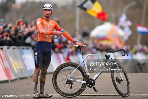 Mathieu Van Der Poel of The Netherlands celebrates at finish line as gold medal winner during the 75th UCI World Championships Cyclo-Cross 2024 -...